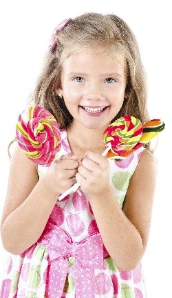 Happy little girl with lollipop isolated