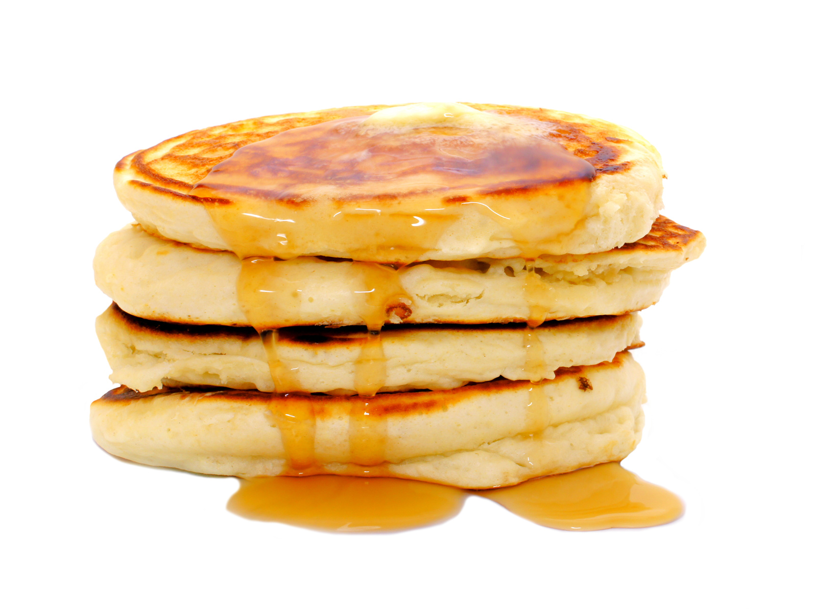 Stack of breakfast pancakes with dripping syrup isolated