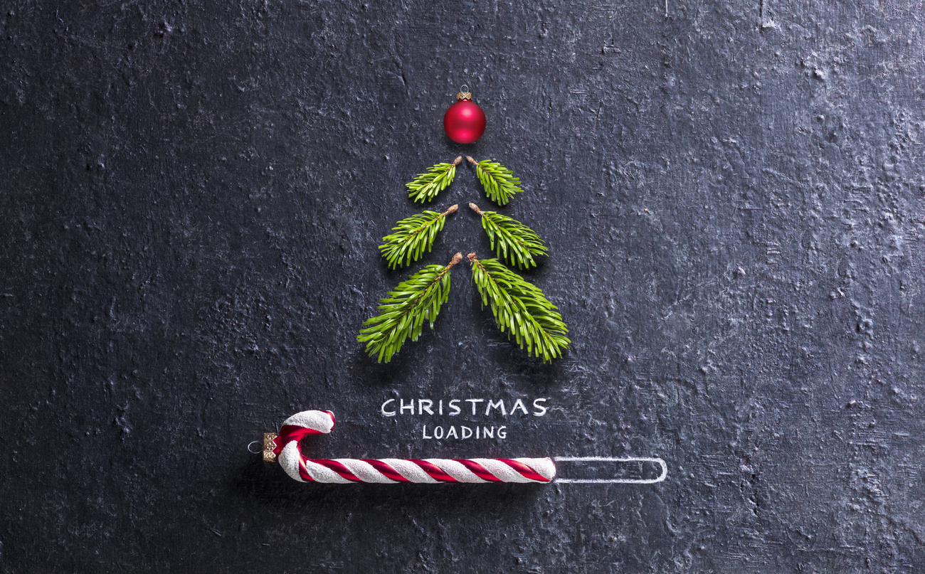 Christmas Loading Concept – Tree And Candy Canes On Black Stone